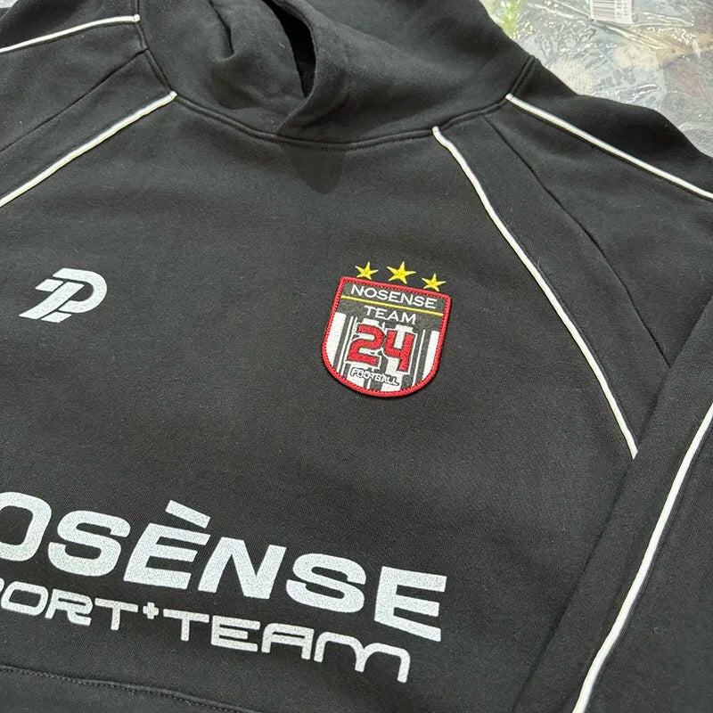Baggy Y2K hoodie with glitch and pixel designs