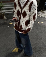 bold graphic pullover, layered streetwear look, soft knit pullover with flame design, y2k fashion statement