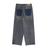 Cut Jeans with a mud-dye knife