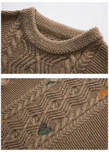 grunge knit sweater with heavyweight fabric, layered urban look for cold weather, street fashion menswear trend for seasonal 