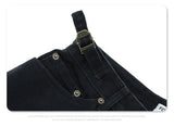 Washed and worn multi-pocket cargo jeans