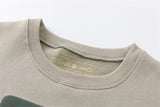 bold flame design top, high-street layer, cozy fashion fit, stylish street outfit, modern aesthetic appeal