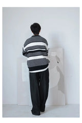 grunge knit sweater with heavyweight fabric, layered urban look for cold weather, street fashion menswear trend for seasonal 