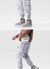 streetwear mens hip hop jogging pants casual men trousers big size loose sweatpants male 2023 new multi pocket harem pants 5xl unique joggers style 2901