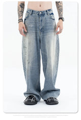 Splashing ink to wash old baggy retro jeans
