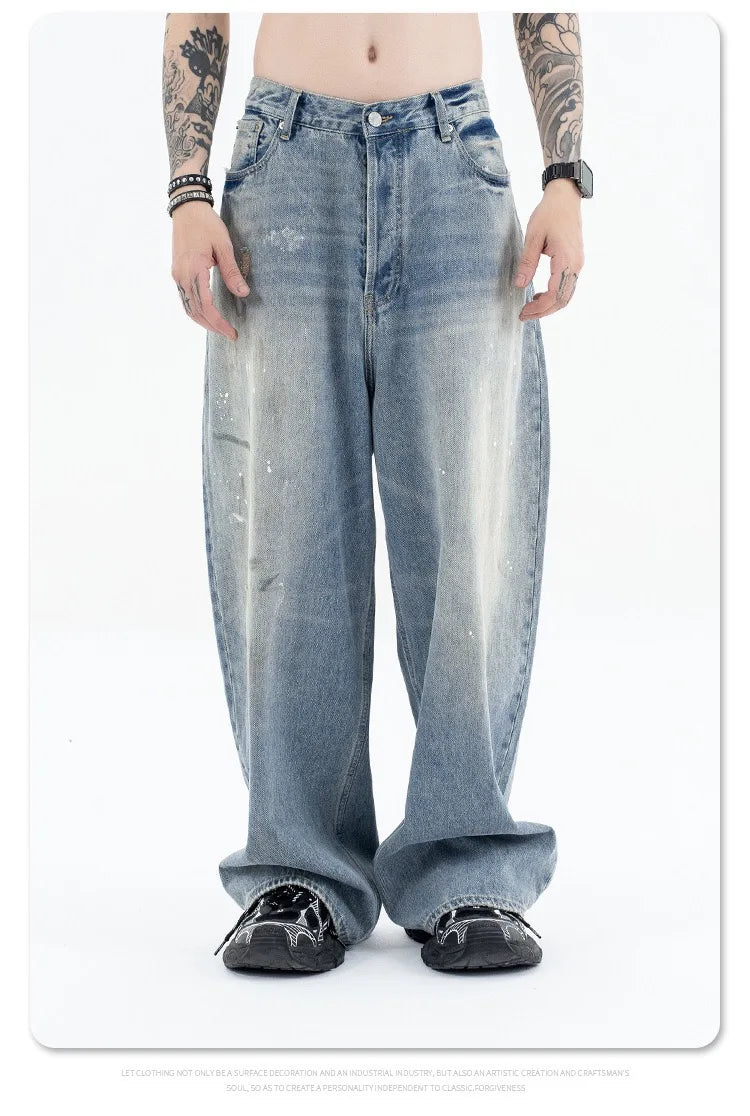 Splashing ink to wash old baggy retro jeans