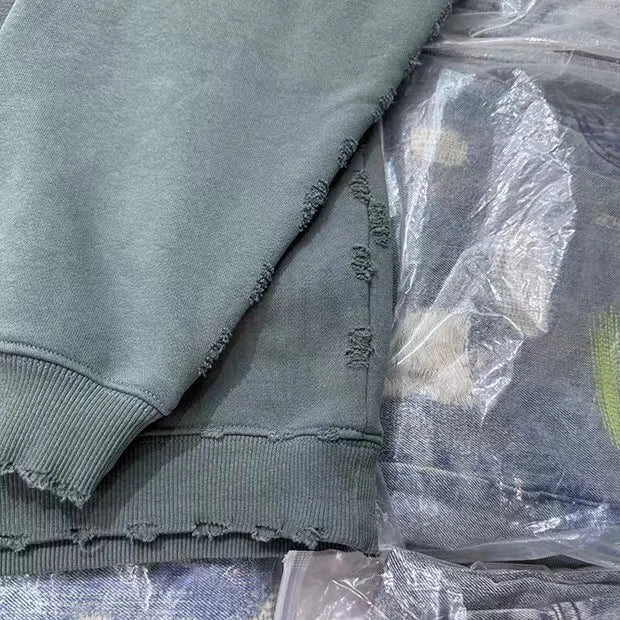 Street-style hoodie with glitch and digital matrix aesthetic