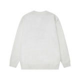 grunge knit sweater with heavyweight fabric, layered urban look for cold weather, street fashion menswear trend for seasonal 