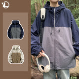 checkered varsity coat, layered streetwear look, trendy