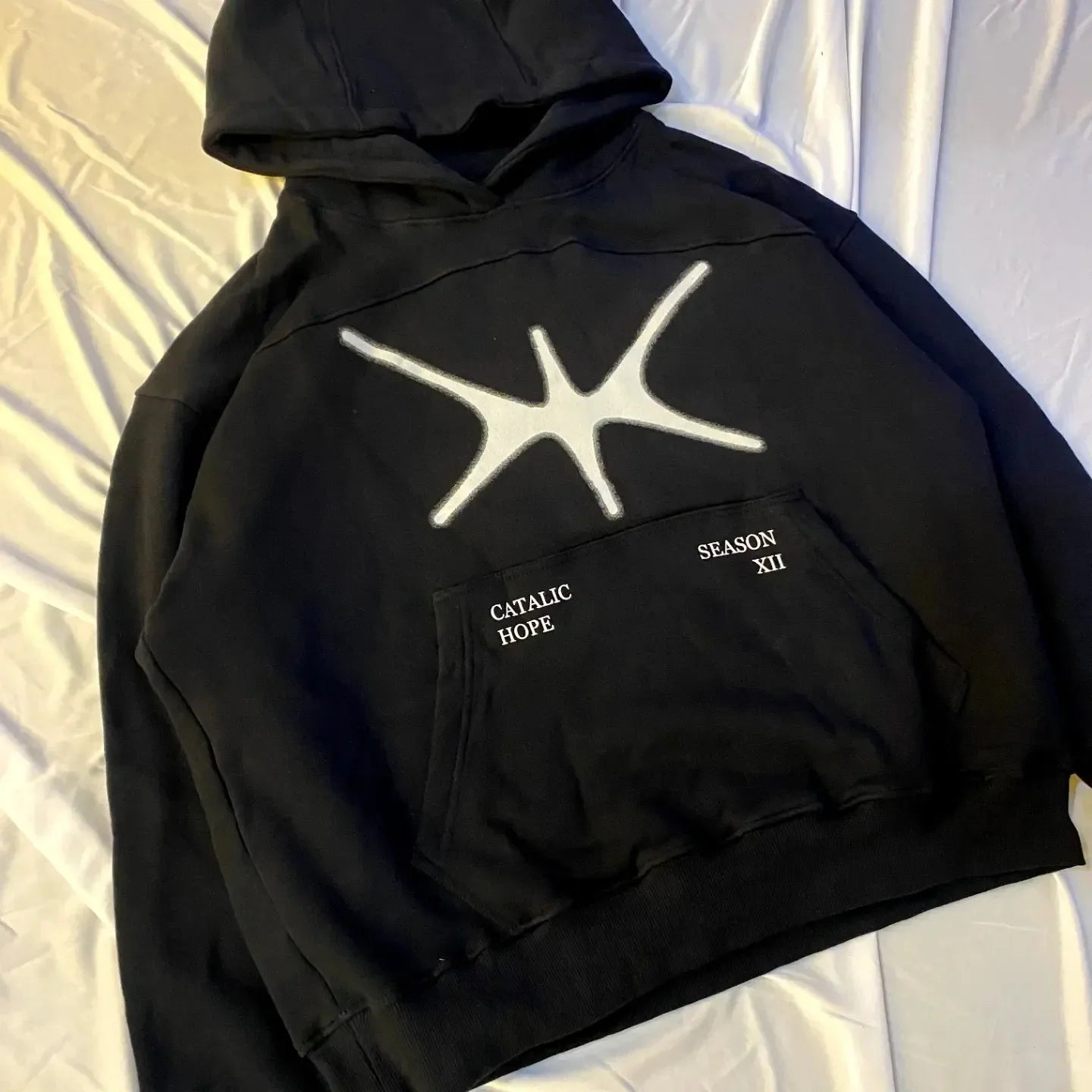 Cybercore hoodie with glitch-effect typography