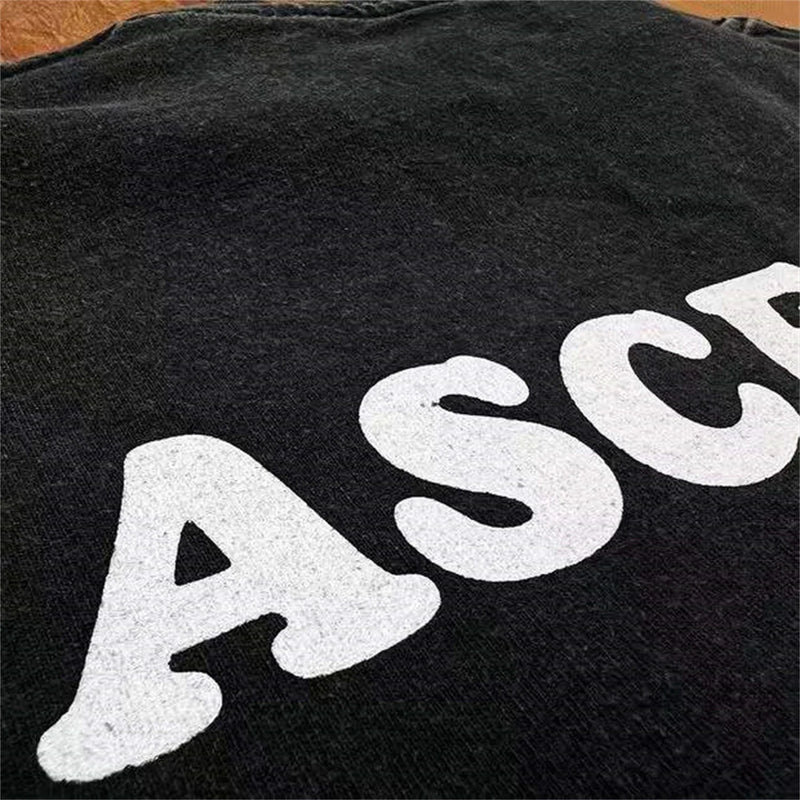 Distressed grunge tee with burned font and noise fill