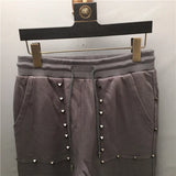 high new novelty luxury men 2022 classic full metal rivets pockets comfortable cotton parkour sweat casual pants sweatpants d50 unique joggers style 4419