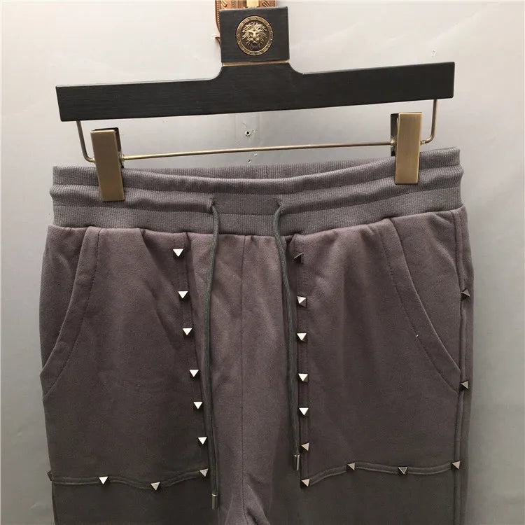 high new novelty luxury men 2022 classic full metal rivets pockets comfortable cotton parkour sweat casual pants sweatpants d50 unique joggers style 4419