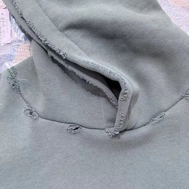 Techwear-inspired Y2K hoodie with holographic print