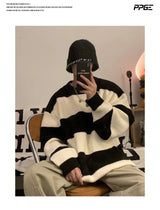 techwear flame knit sweater with structured oversized fit, ideal for cold streetwear layers, men’s streetwear clothing piece 