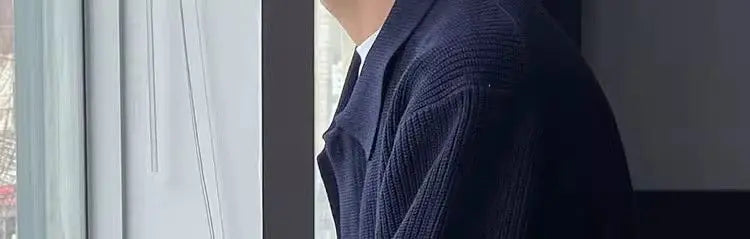 grunge knit sweater with heavyweight fabric, layered urban look for cold weather, street fashion menswear trend for seasonal 