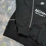 Oversized Y2K hoodie with nostalgic 90s elements
