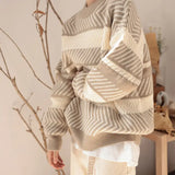 grunge knit sweater with heavyweight fabric, layered urban look for cold weather, street fashion menswear trend for seasonal 