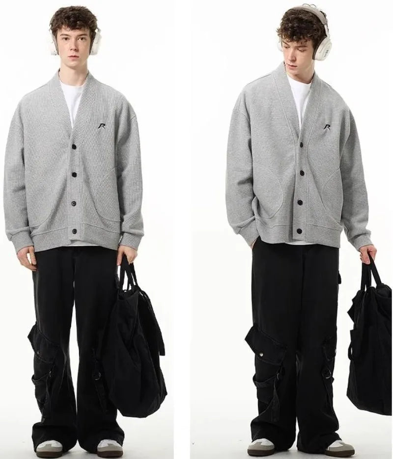 bold graphic pullover, layered streetwear look, soft knit pullover with flame design, y2k fashion statement