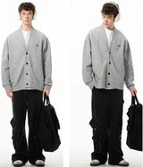 bold graphic pullover, layered streetwear look, soft knit pullover with flame design, y2k fashion statement