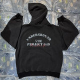 Dark futuristic hoodie with sci-fi cityscape designs