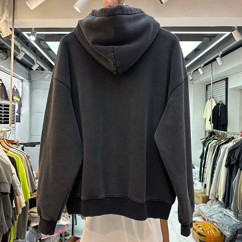 Skater-style hoodie with flame graphics and streetwear vibes