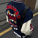 checkered varsity coat, layered streetwear look, trendy