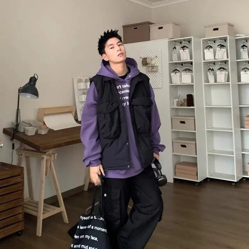panel varsity outerwear, 2025 trend, for men, fall streetwear outfit, oversized style, layered fashion, modern aesthetic, graphic detail