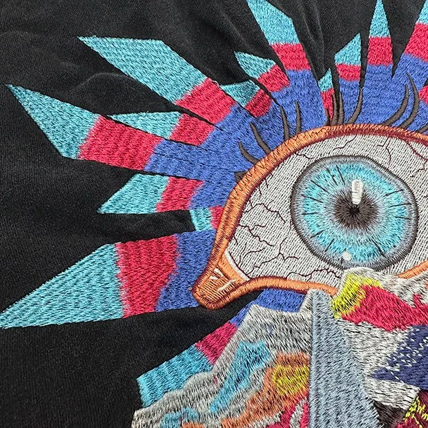 Retro cybercore hoodie with high-contrast neon artwork
