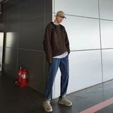 varsity graphic knit, unisex street look, trendy streetwear apparel for men and women