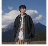 checkered varsity coat, layered streetwear look, trendy
