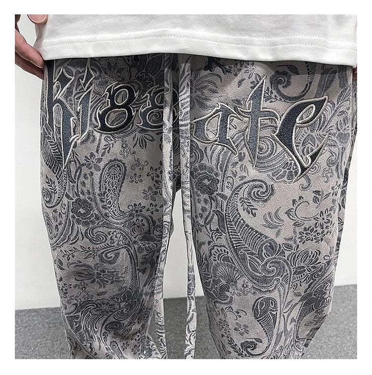 hip hop loose fit elastic waist pants fashion paisy ankle pants mens casual letter embroidery drewstring sportwear pants joggers unique joggers style 3518