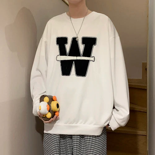 varsity graphic knit, unisex street look, trendy streetwear apparel for men and women