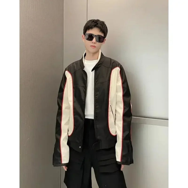 panel varsity outerwear, 2025 trend, for men, fall streetwear outfit, oversized style, layered fashion, modern aesthetic, graphic detail