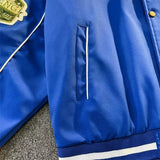 retro baseball varsity, layering staple, stylish modern outerwear, premium street look, trendsetting streetstyle