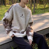 bold graphic pullover, layered streetwear look, soft knit pullover with flame design, y2k fashion statement