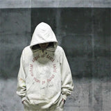 Sci-fi aesthetic hoodie with chrome robotic patterns