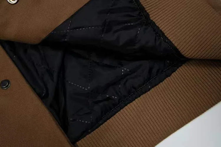 leather varsity jacket, fall winter fit, for men, fall streetwear outfit, oversized style, layered fashion, modern aesthetic, graphic detail