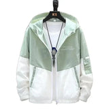 panel varsity outerwear, 2025 trend, for men, fall streetwear outfit, oversized style, layered fashion, modern aesthetic, graphic detail