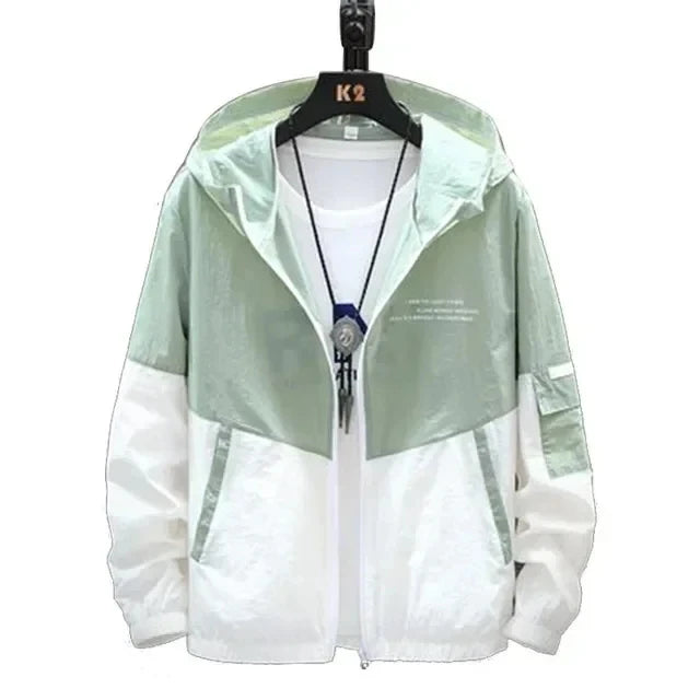 panel varsity outerwear, 2025 trend, for men, fall streetwear outfit, oversized style, layered fashion, modern aesthetic, graphic detail
