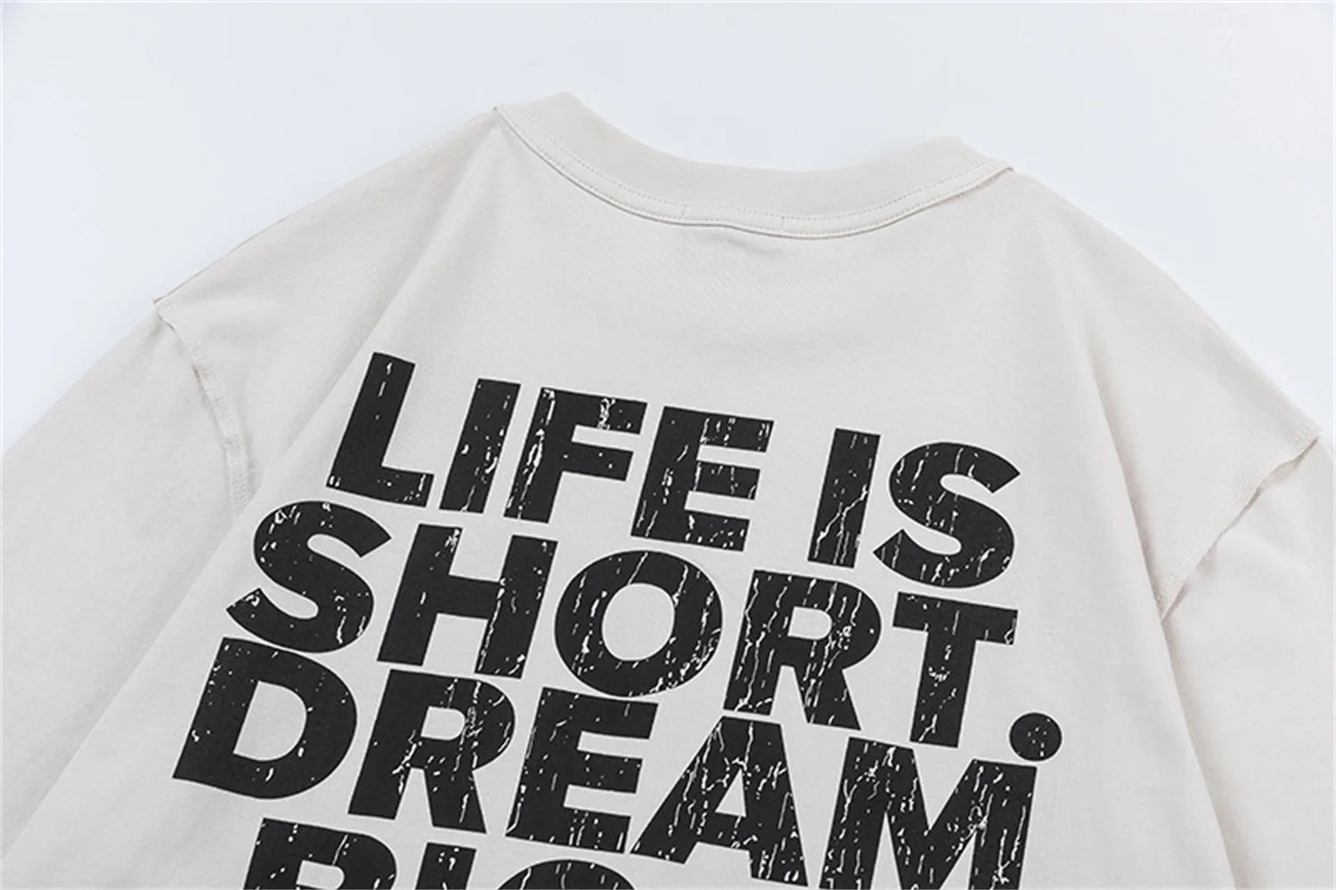 Trap-themed tee with icy font and motivational quote