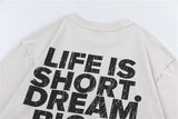 Trap-themed tee with icy font and motivational quote