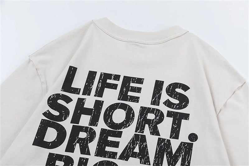 Trap-themed tee with icy font and motivational quote