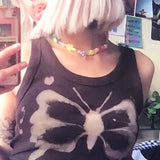 Dreamscape tee with stars, wings, and heart backprint