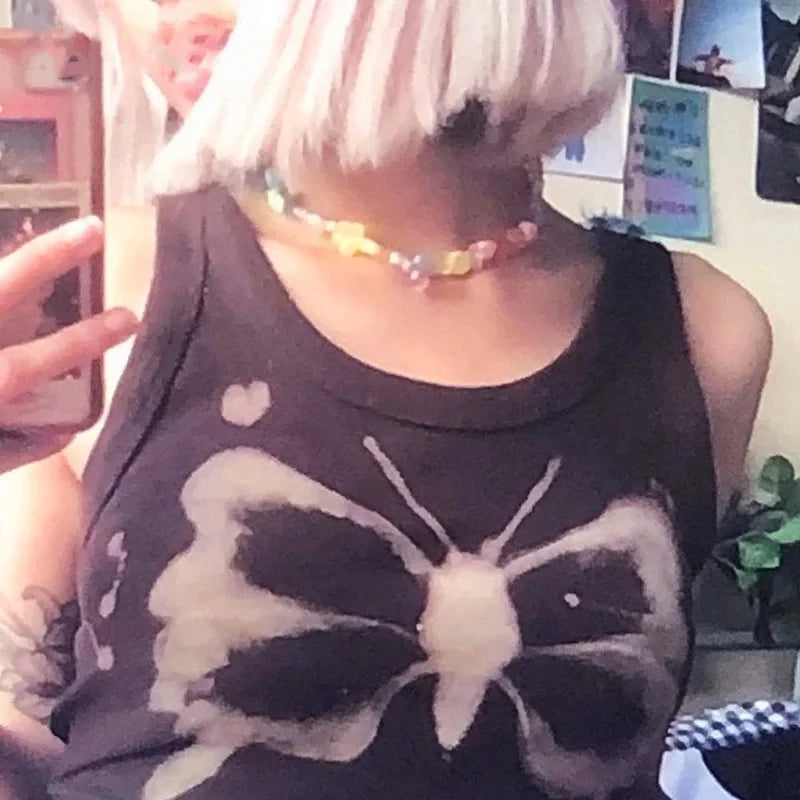 Dreamscape tee with stars, wings, and heart backprint