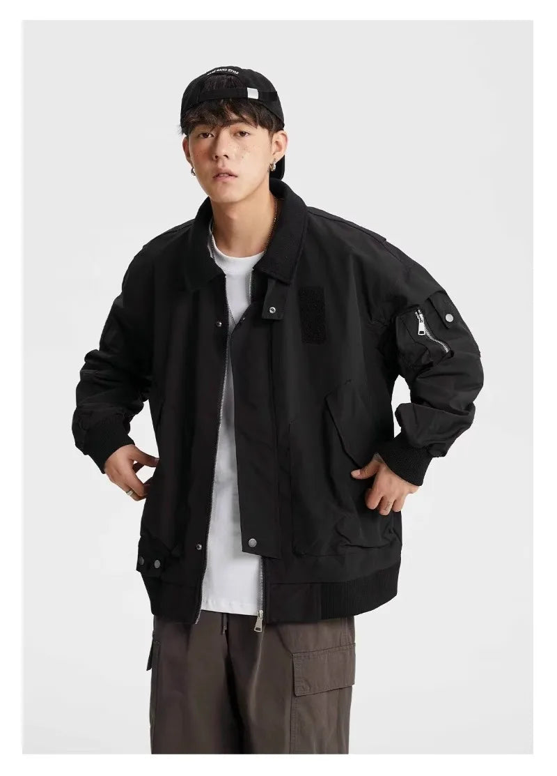 bold graphic coat, high-street look, for men, fall streetwear outfit, oversized style, layered fashion, modern aesthetic, graphic detail