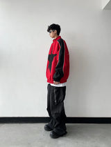 bold graphic coat, high-street look, for men, fall streetwear outfit, oversized style, layered fashion, modern aesthetic, graphic detail