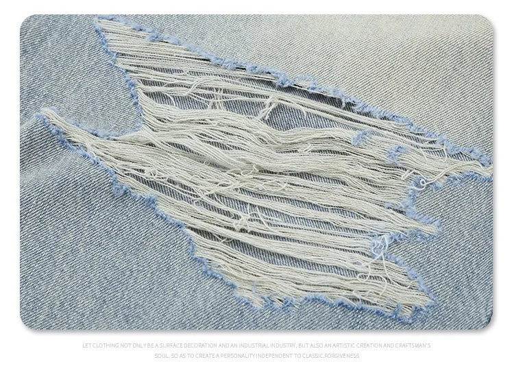 Straight Jeans with torn knees