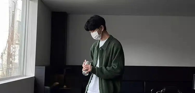 grunge knit sweater with heavyweight fabric, layered urban look for cold weather, street fashion menswear trend for seasonal 