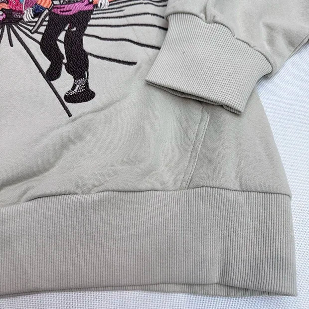 Throwback 2000s hip-hop hoodie with bold bling influence